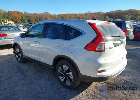 2015 Honda Cr-V Touring z USA, uszkodzony, nr VIN 5J6RM4H9XFL121982